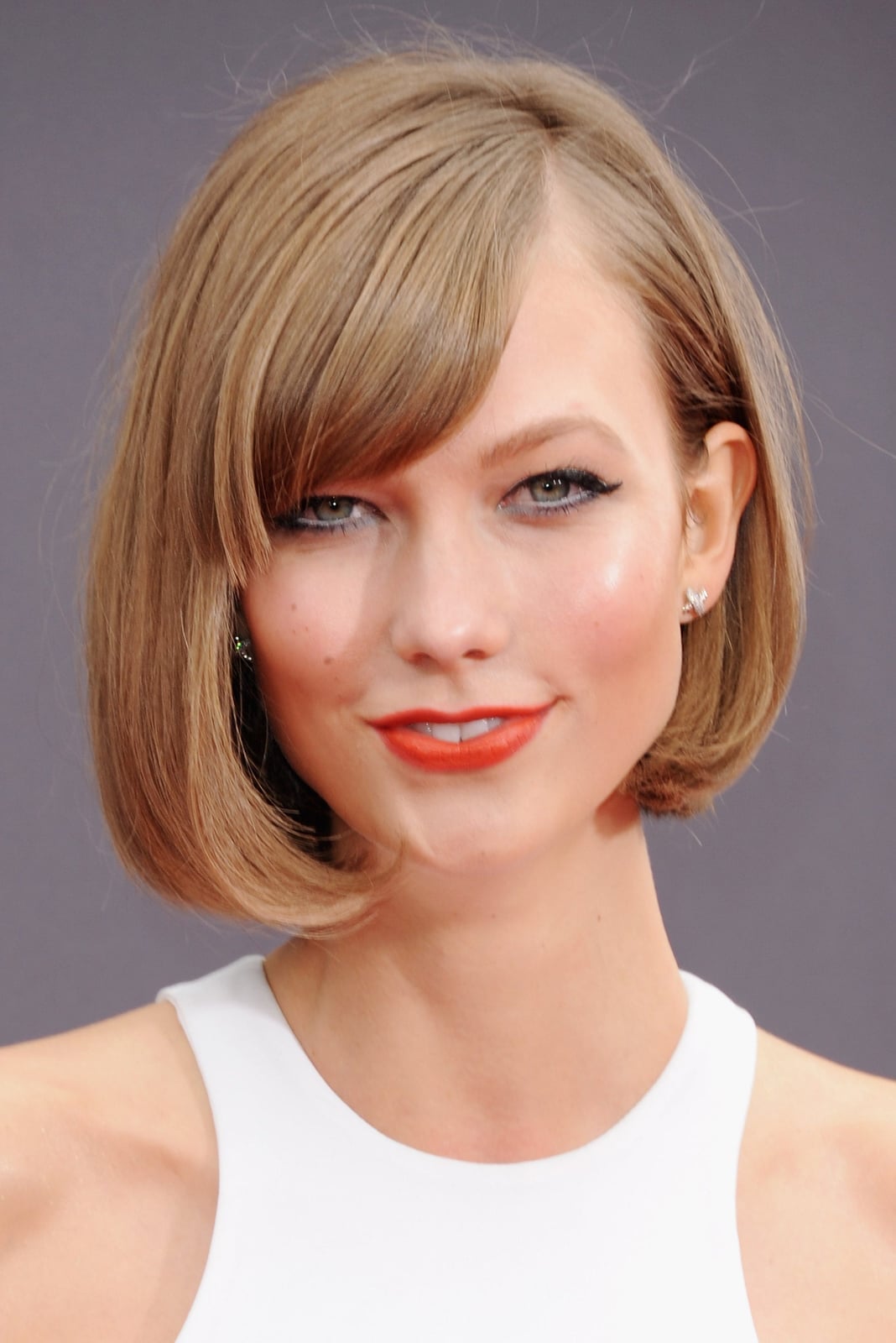Chin Length Ash Blonde Bob With Sweeping Bangs Chin Length Ash Blonde Bob With Sweeping Bangs — Side Part Bangs
