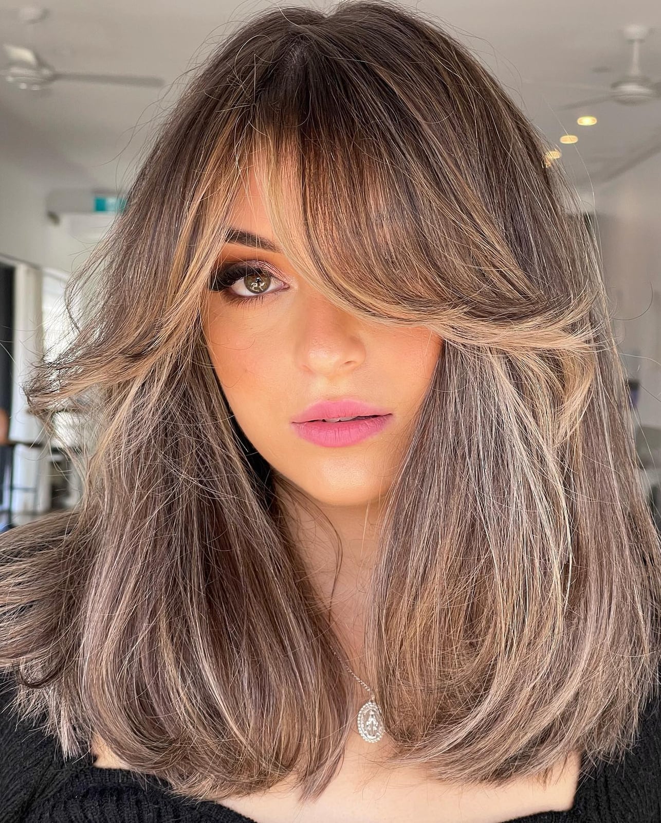 Collarbone Layered Bob With Wavy Curtain Bangs Collarbone Layered Bob With Wavy Curtain Bangs — Side Part Bangs