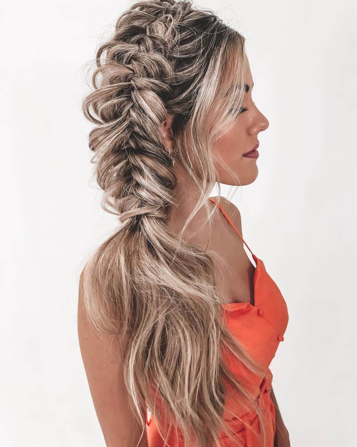 Blonde Fishtail Braid With Waves Blonde Fishtail Braid With Waves — Side Part Braids