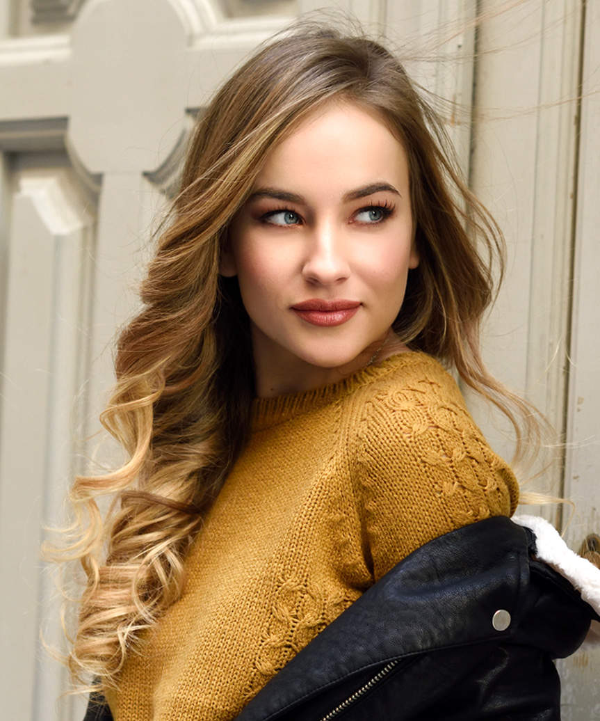 Mid-Back Blonde Balayage With Soft Curls Mid-Back Blonde Balayage With Soft Curls — Side Swept Bangs