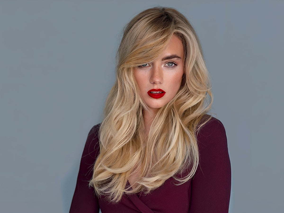 Thick Wavy Platinum Mid-Back Cut Thick Wavy Platinum Mid-Back Cut — Side Swept Bangs