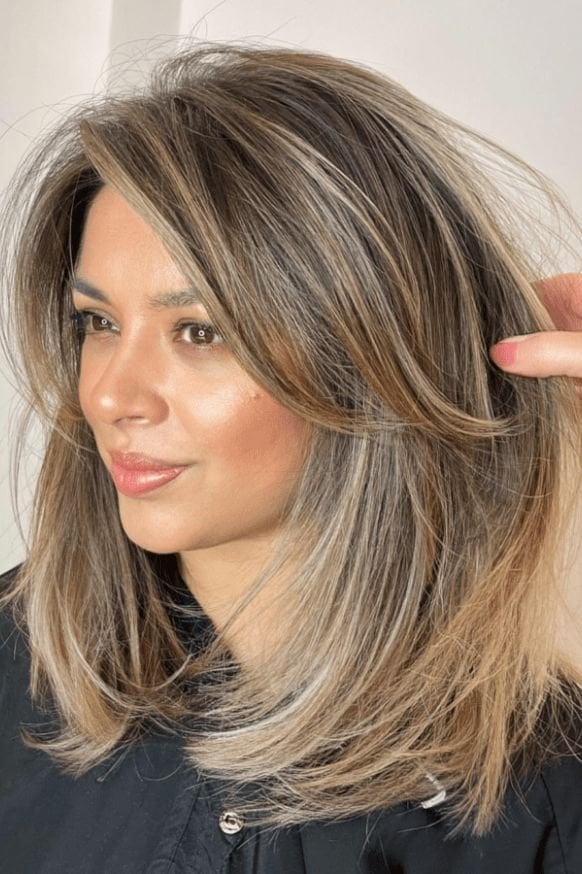 Medium Brown Mid-Back Layers With Balayage Medium Brown Mid-Back Layers With Balayage — Side Swept Bangs