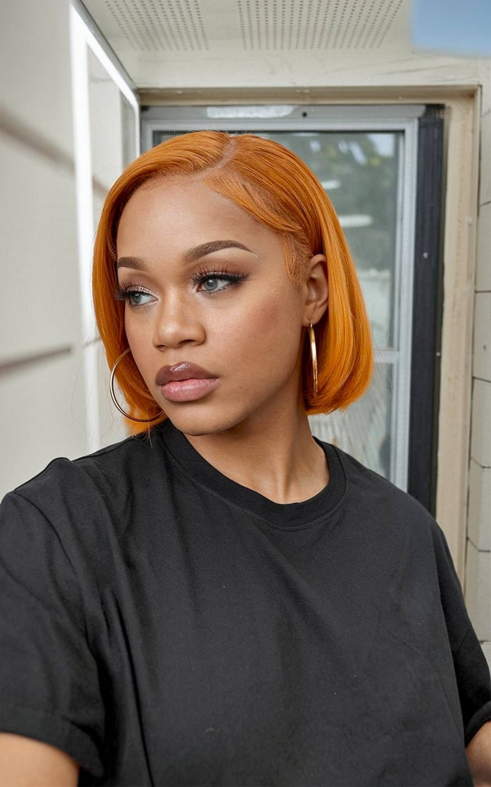 Chin Length Bob With Flipped Ends In Orange — Silk Press Hairstyles