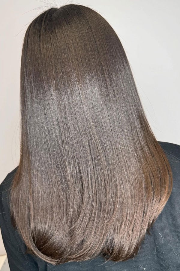 Glossy Mid-Back Layered Blowout — Silk Press Hairstyles