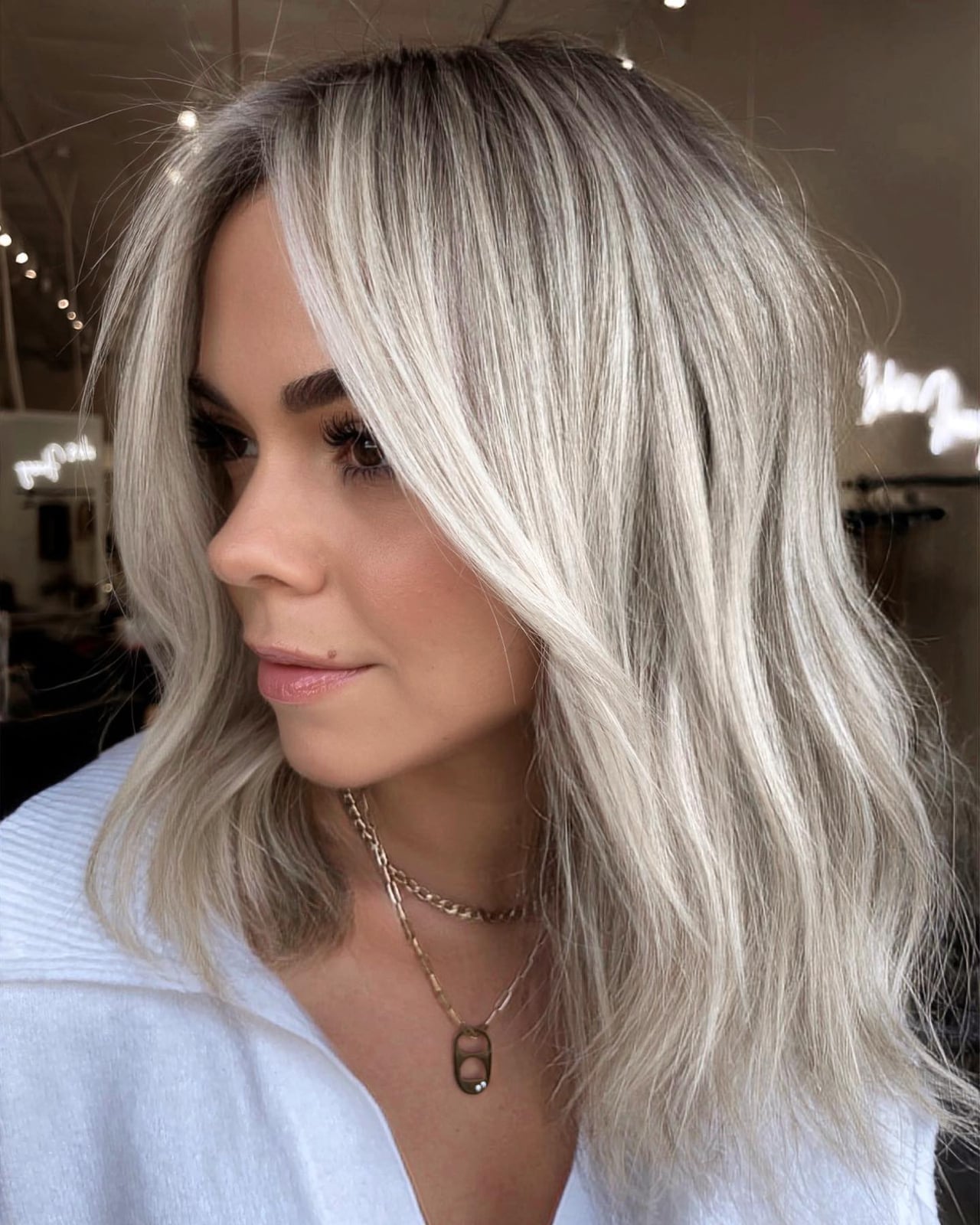 Collarbone Wavy Hair With Blended Silver Highlights