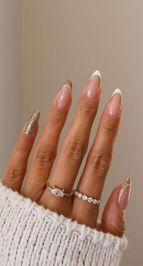 Sheer Nude Medium Almond Gold Glitter French, Close-Up Take Sheer Nude Medium Almond Gold Glitter French, Close-Up Take — Simple New Years Nails