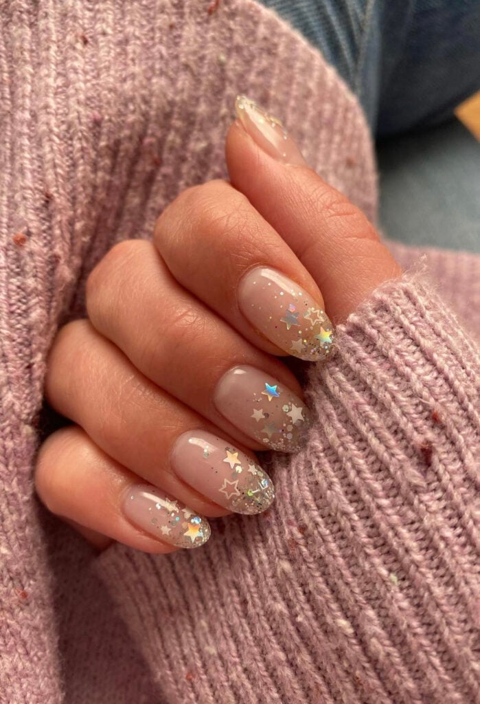 Sheer Nude Short Almond Nails with Stars Sheer Nude Short Almond Nails with Stars — Simple New Years Nails
