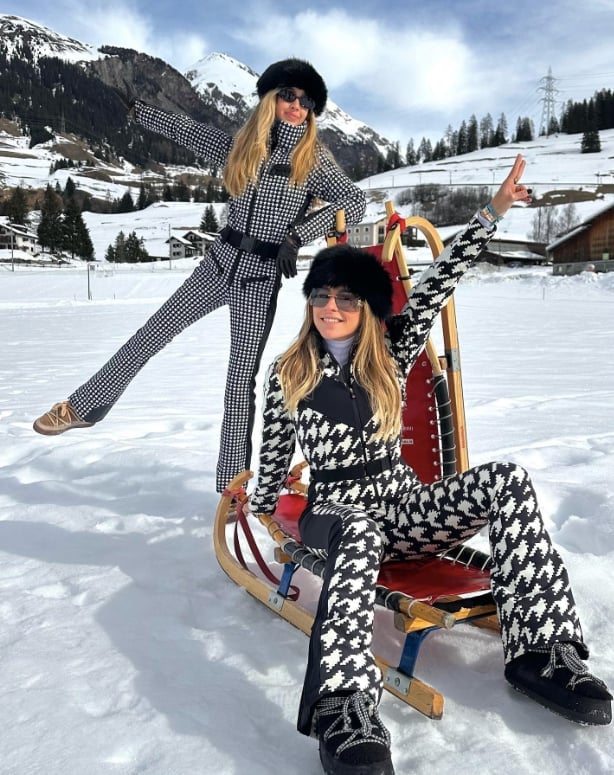 Houndstooth ski suits with fur hats — Skiing Outfit