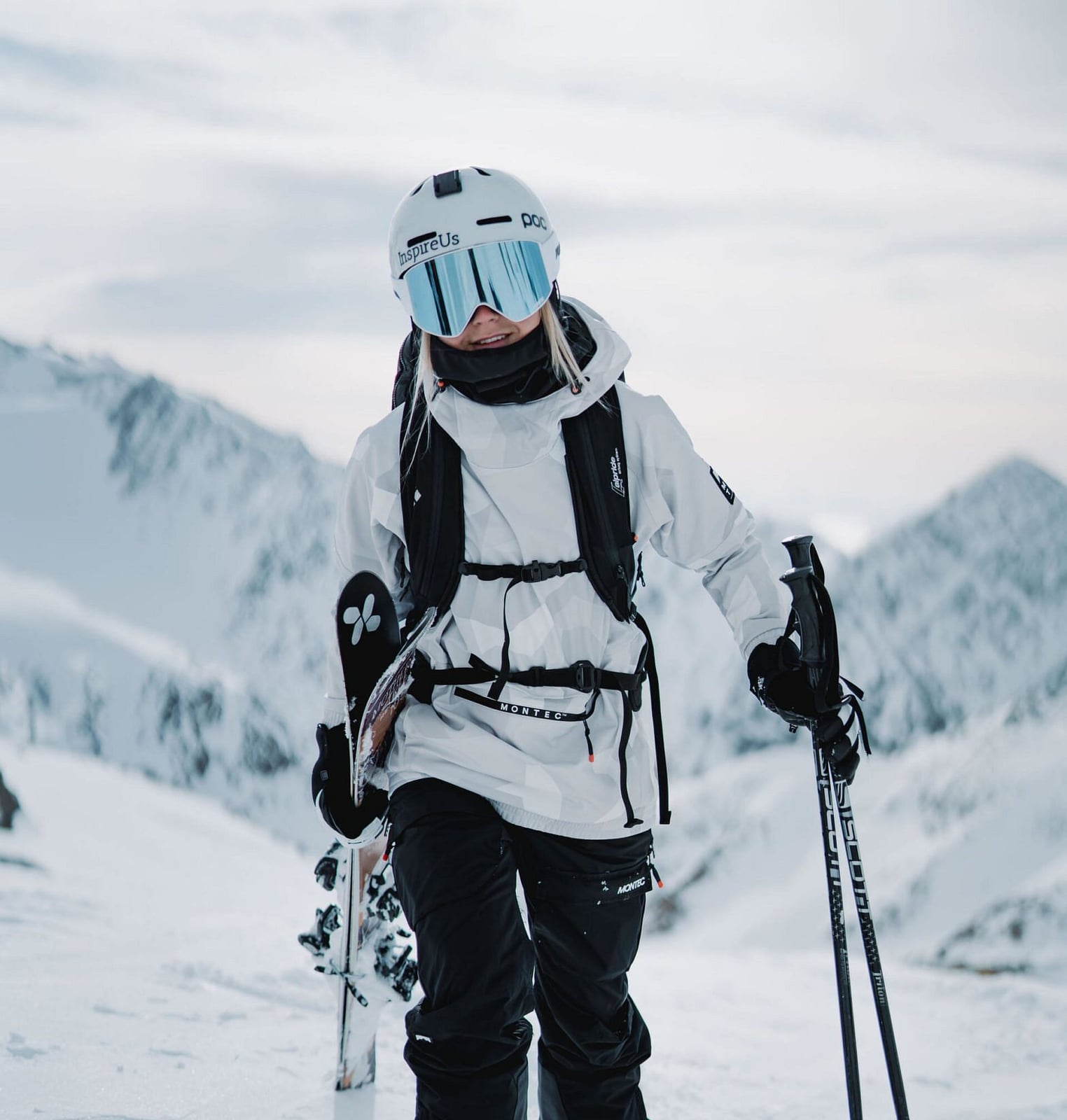White ski jacket and black ski pants ensemble — Skiing Outfit