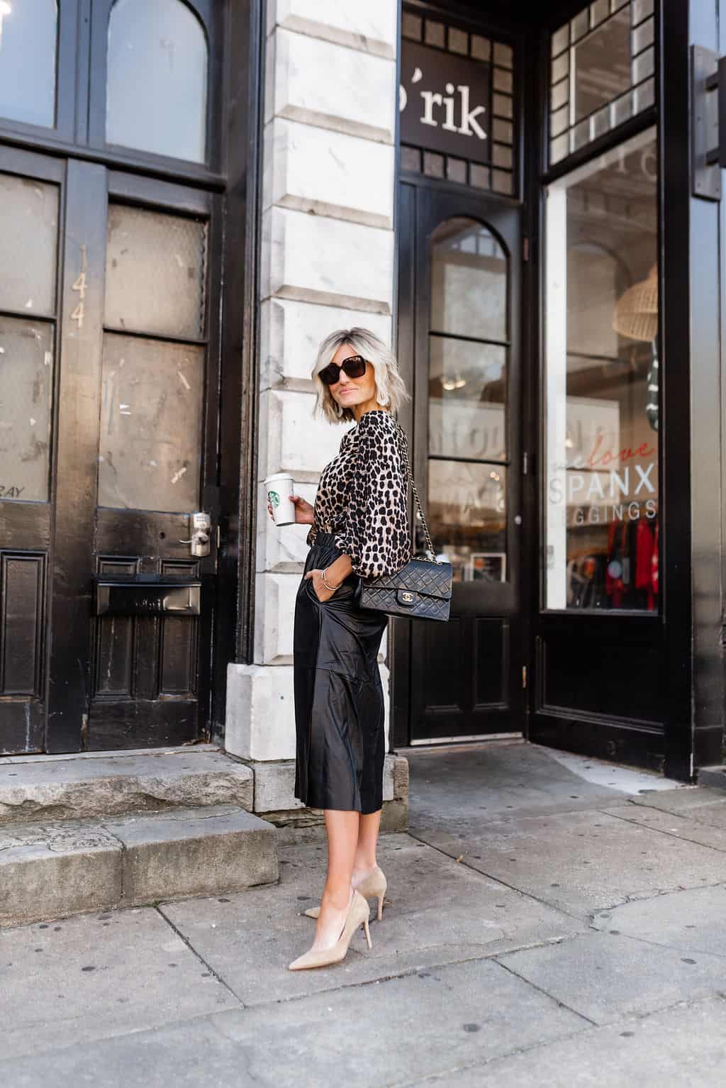 Black Faux Leather Midi Skirt with Leopard Blouse, Close-Up Take — Skirt Outfit Work