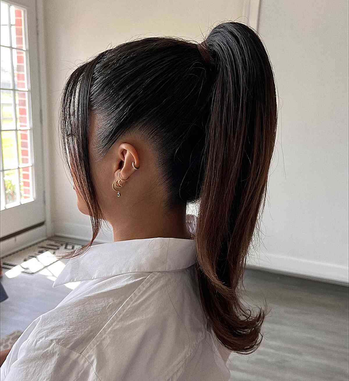 High Ponytail With Curtain Bangs — Sleek Ponytail