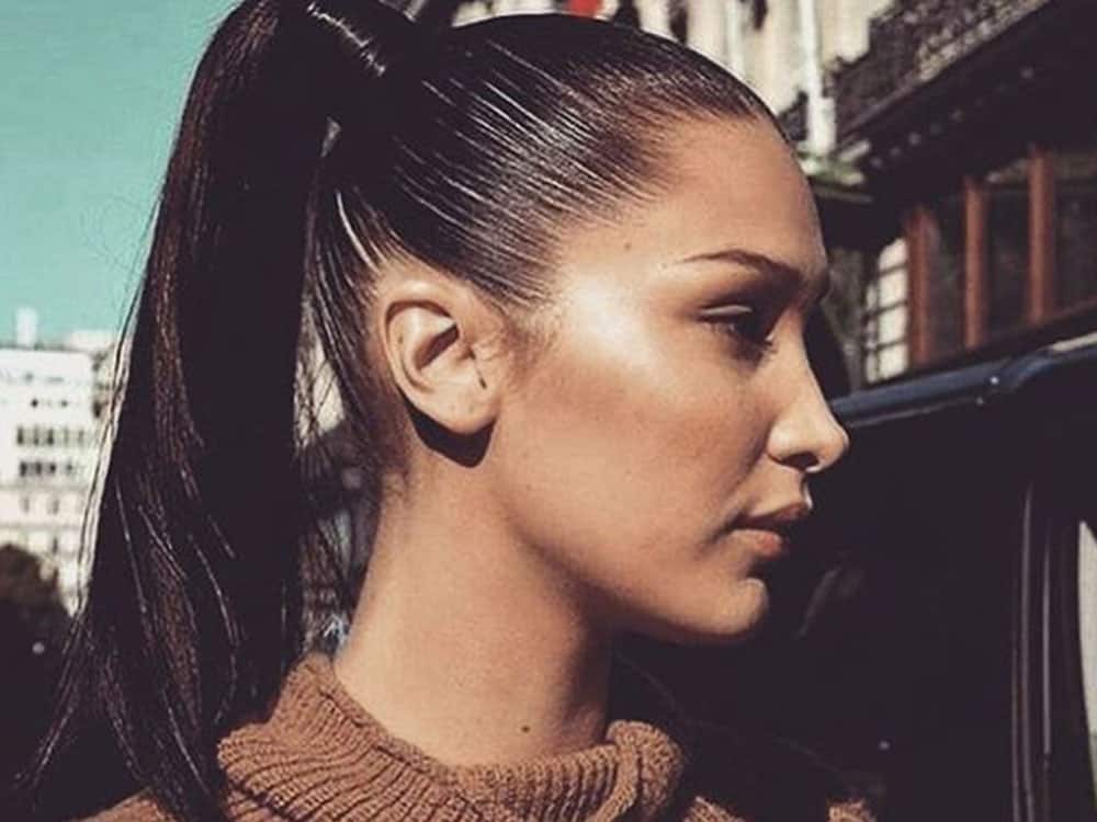 Ultra-Sleek High Dark Brown Ponytail With Creating A Sharp — Sleek Ponytail