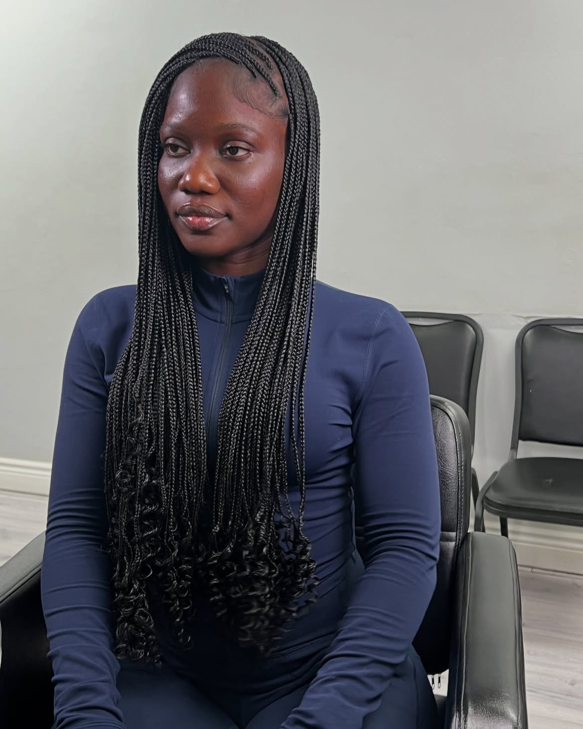Sleek Waist Length Box Braids With Curly Ends