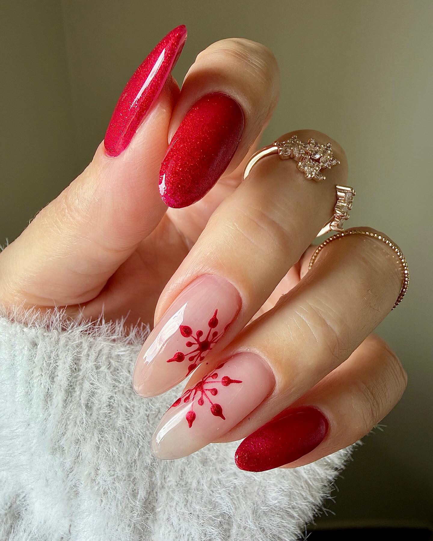 Sparkling Red Snowflake Almond Nails