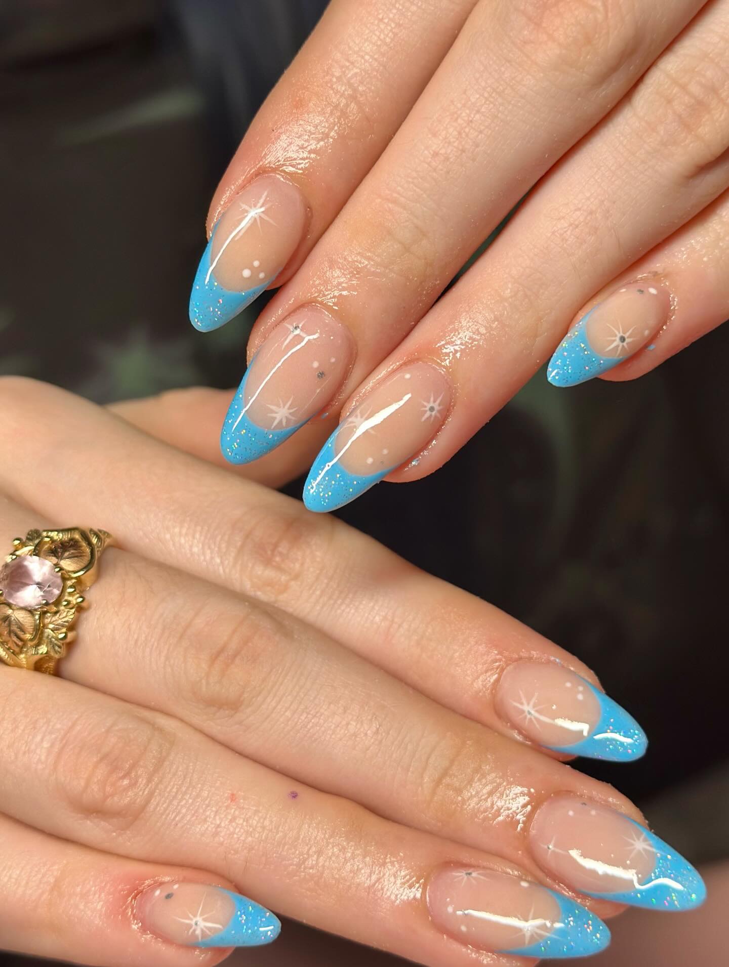 Sparkling Sky Blue French Almond Nails