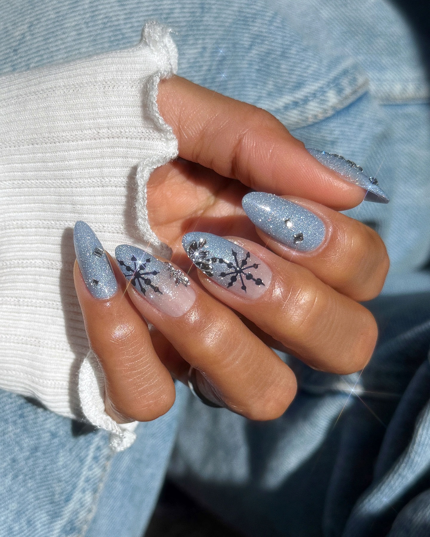 Sparkling Snowflake Almond Nails with Rhinestones