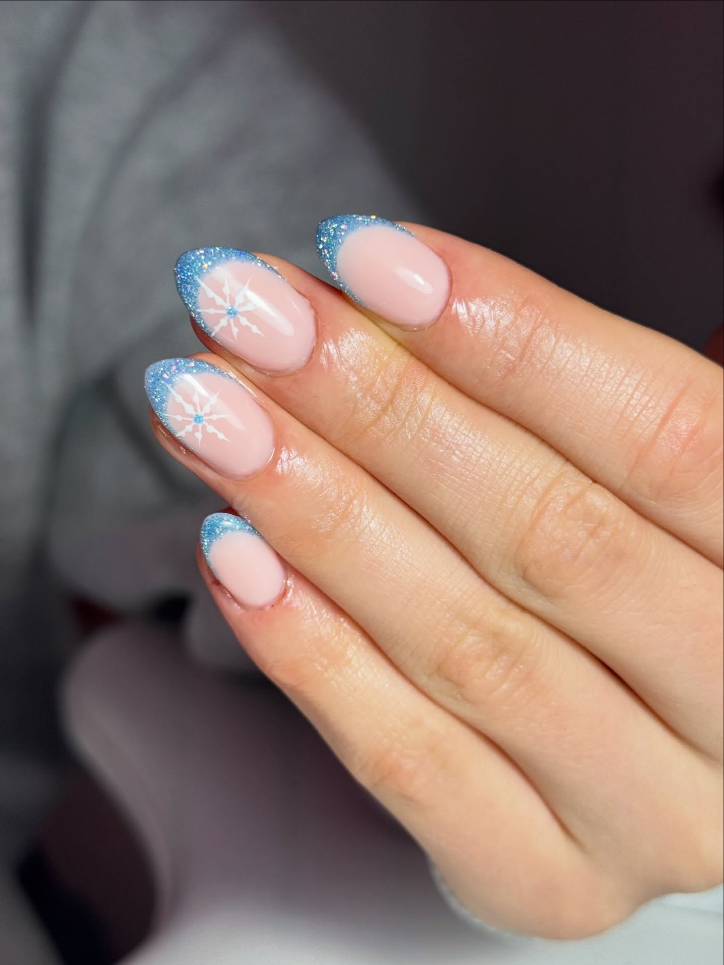 Sparkling Snowflake French Tip Almond Nails