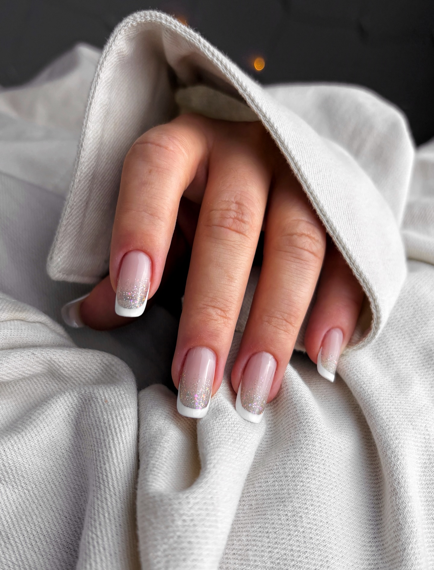 Sparkling White French Tip Medium Almond Nails