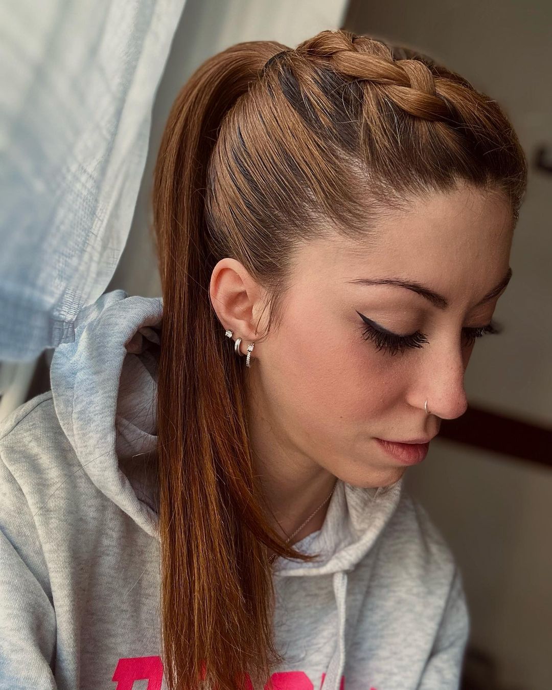 Fine Blonde Braided Ponytail — Sports Hair