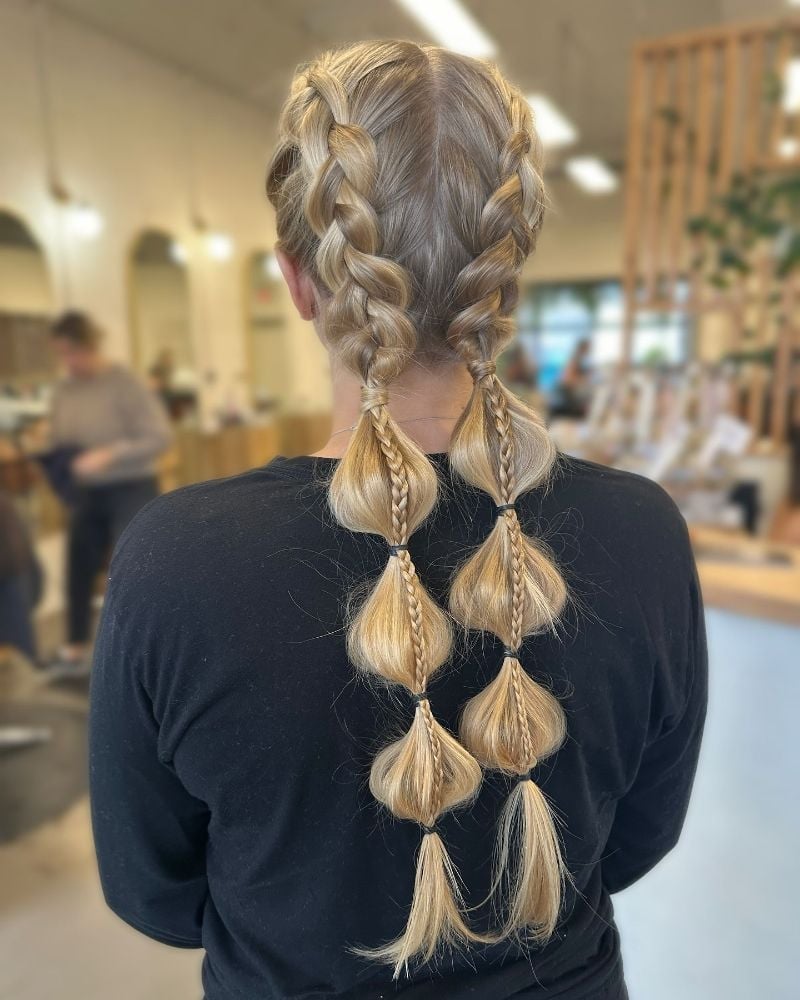 Long Blonde Braids With Decorative Loops — Sports Hair