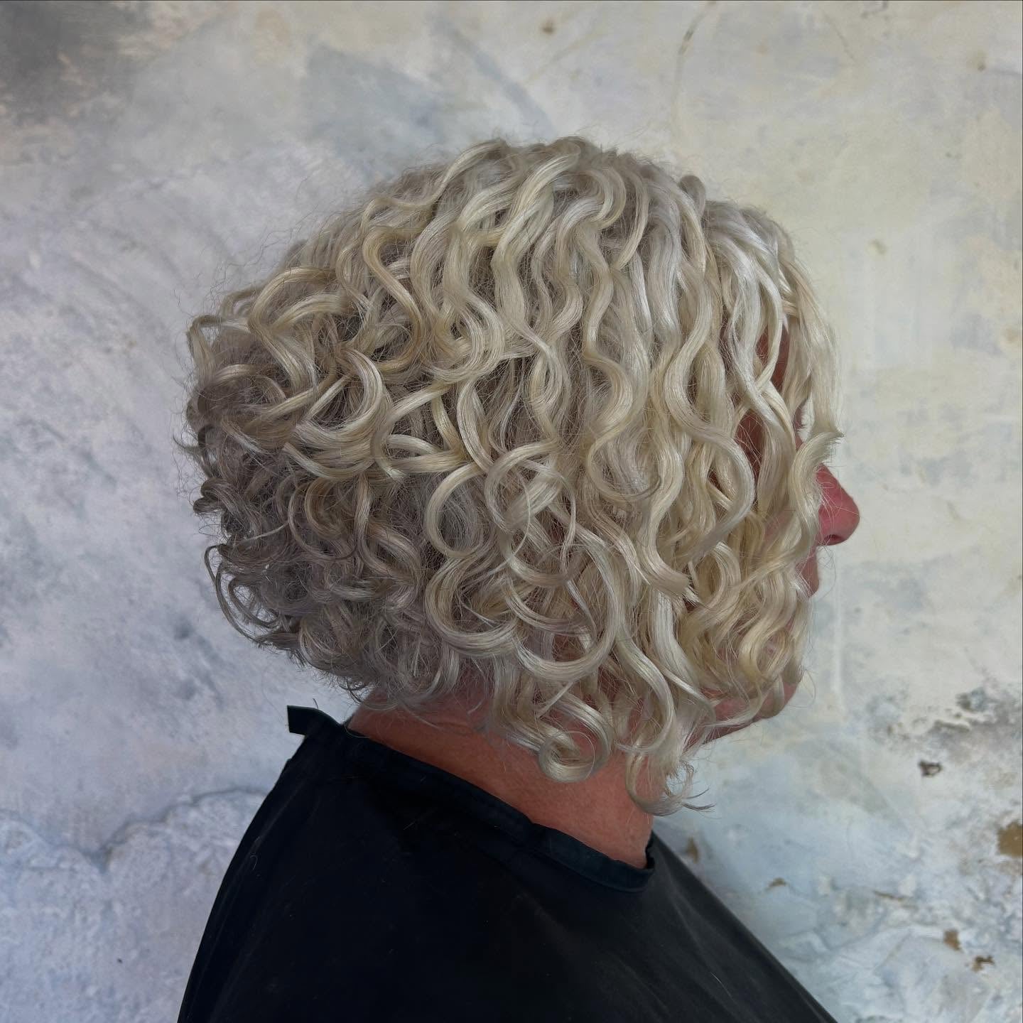 Voluminous Curly Ash Blonde Bob Voluminous Curly Ash Blonde Bob — Stacked Bob