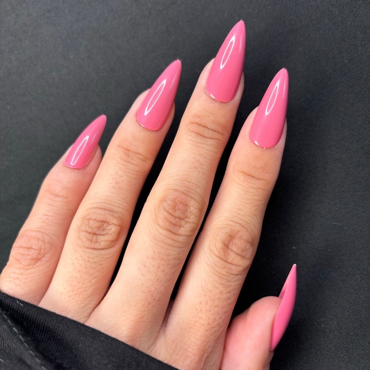 Bright Pink Glossy Stiletto Nails