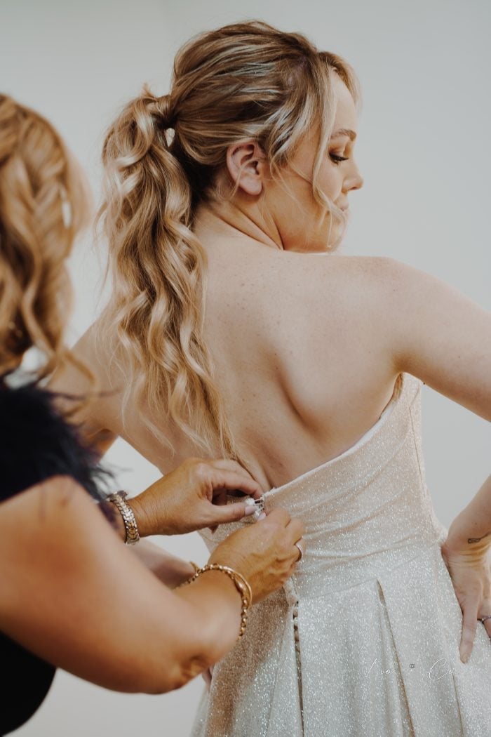 Textured Low Ponytail With Waves — Strapless Dresses Hairstyles