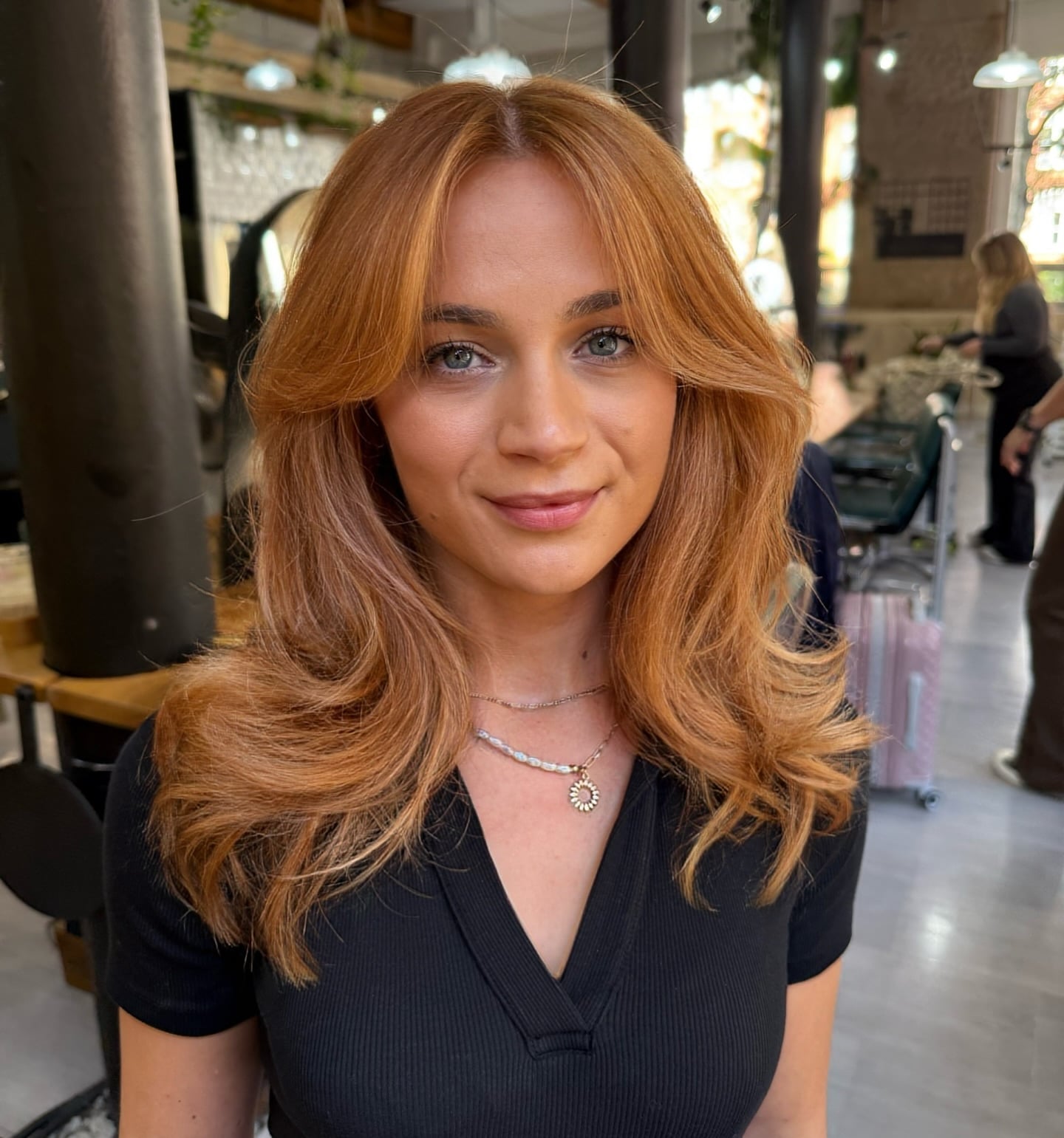 Rich Strawberry Blonde With Face-Framing Layers