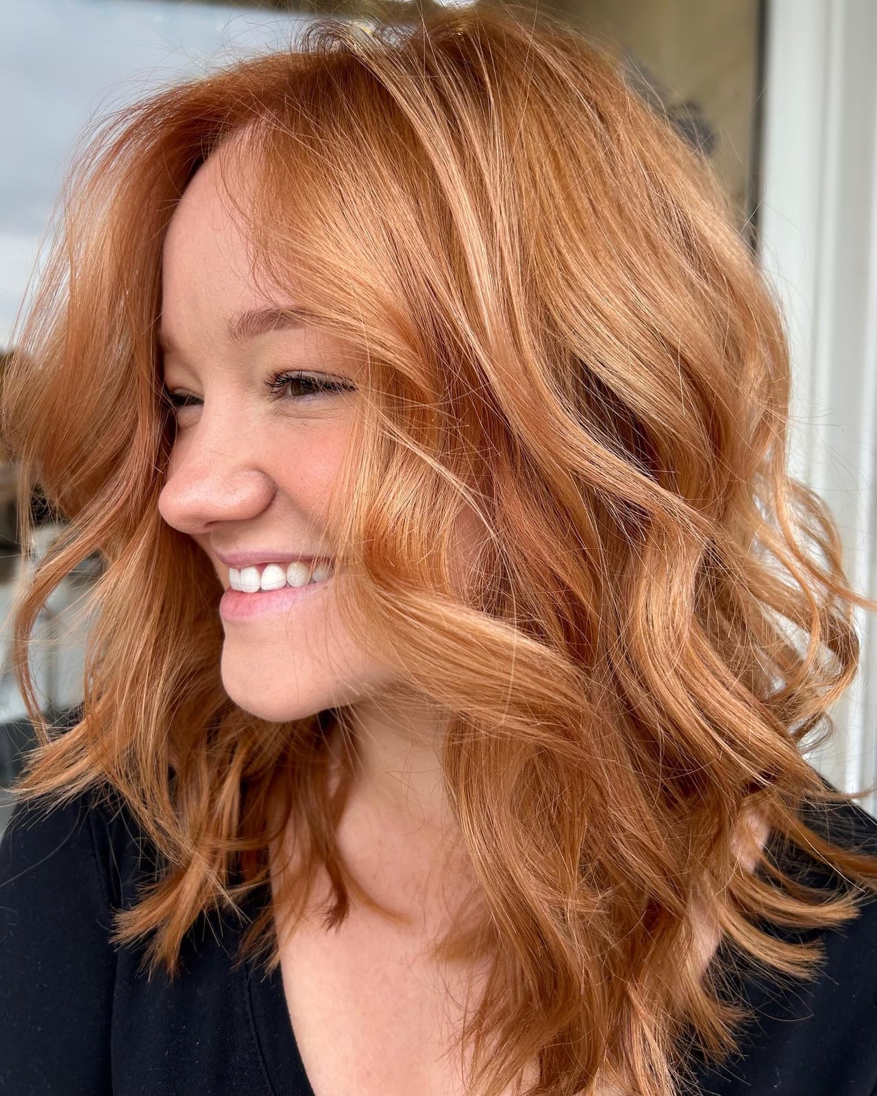 Sun-Kissed Strawberry Blonde Lob With Curtain Bangs