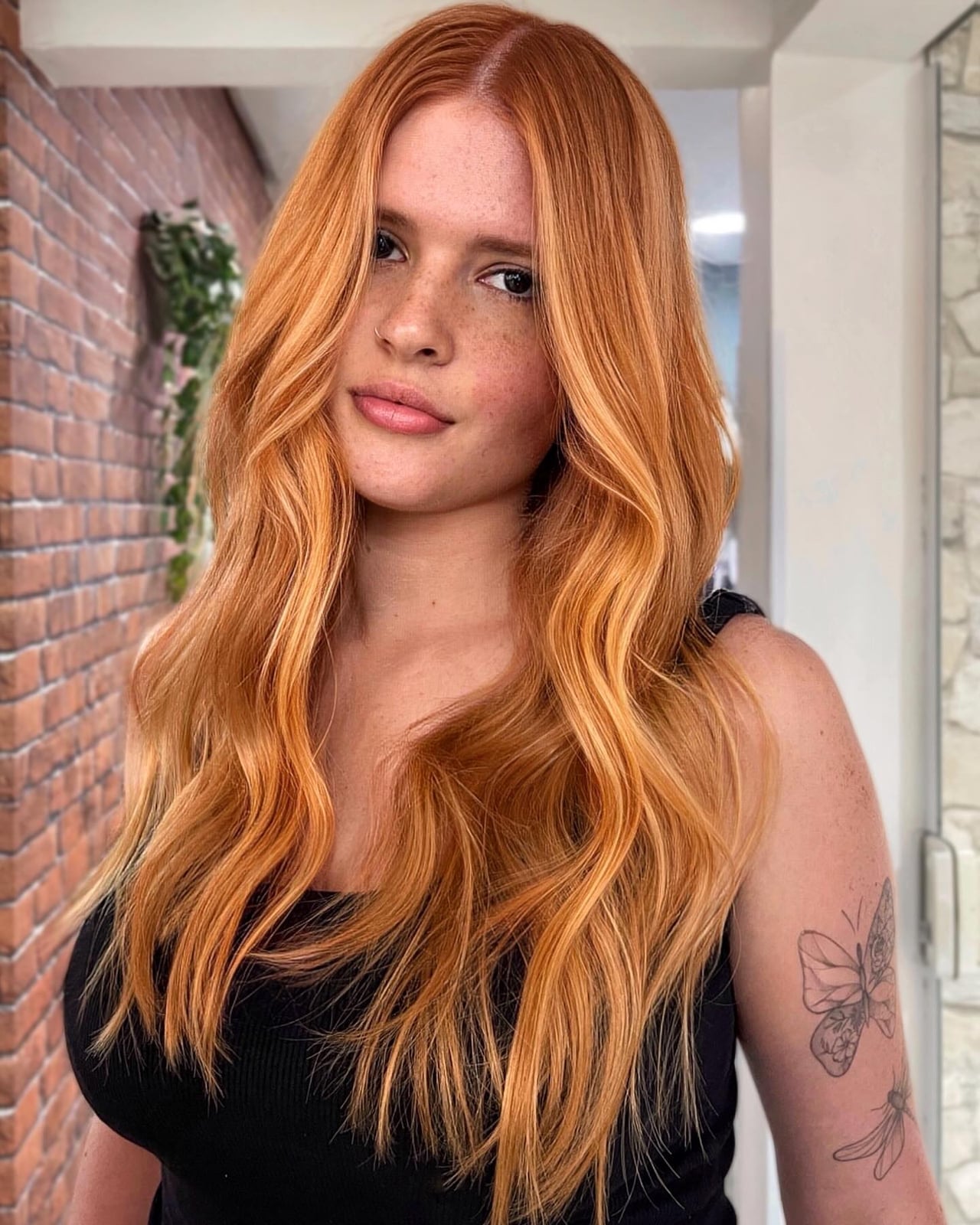 Vibrant Strawberry Blonde With Lighter Highlights