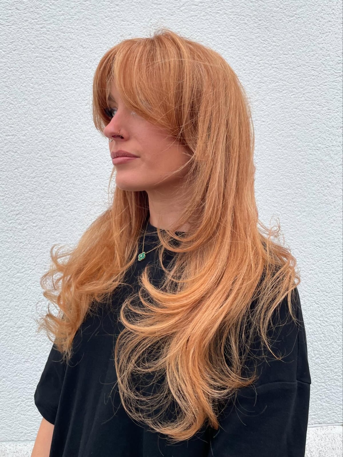 Long Strawberry Blonde Balayage With Curtain Bangs