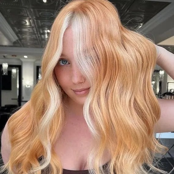 Vibrant Strawberry Blonde With Face-Framing Highlights