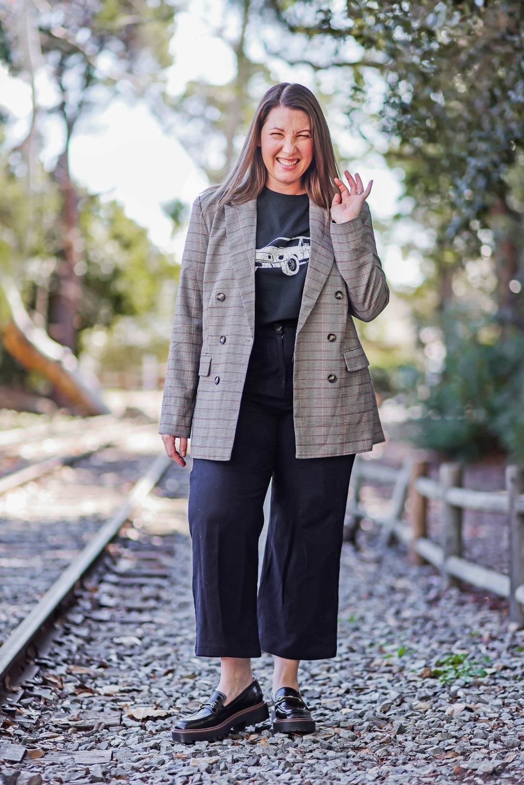 Plaid Blazer with Graphic Tee and Navy Wide-Leg Trousers Plaid Blazer with Graphic Tee and Navy Wide-Leg Trousers — Teacher Outfits