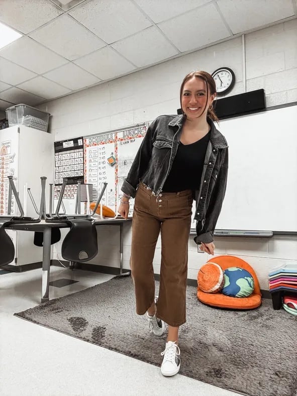 Gray Cropped Denim Jacket Over Black Tank and Brown Trousers Gray Cropped Denim Jacket Over Black Tank and Brown Trousers — Teacher Outfits