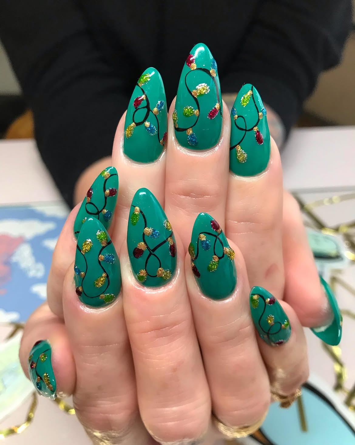 Teal Christmas Lights Almond Nails