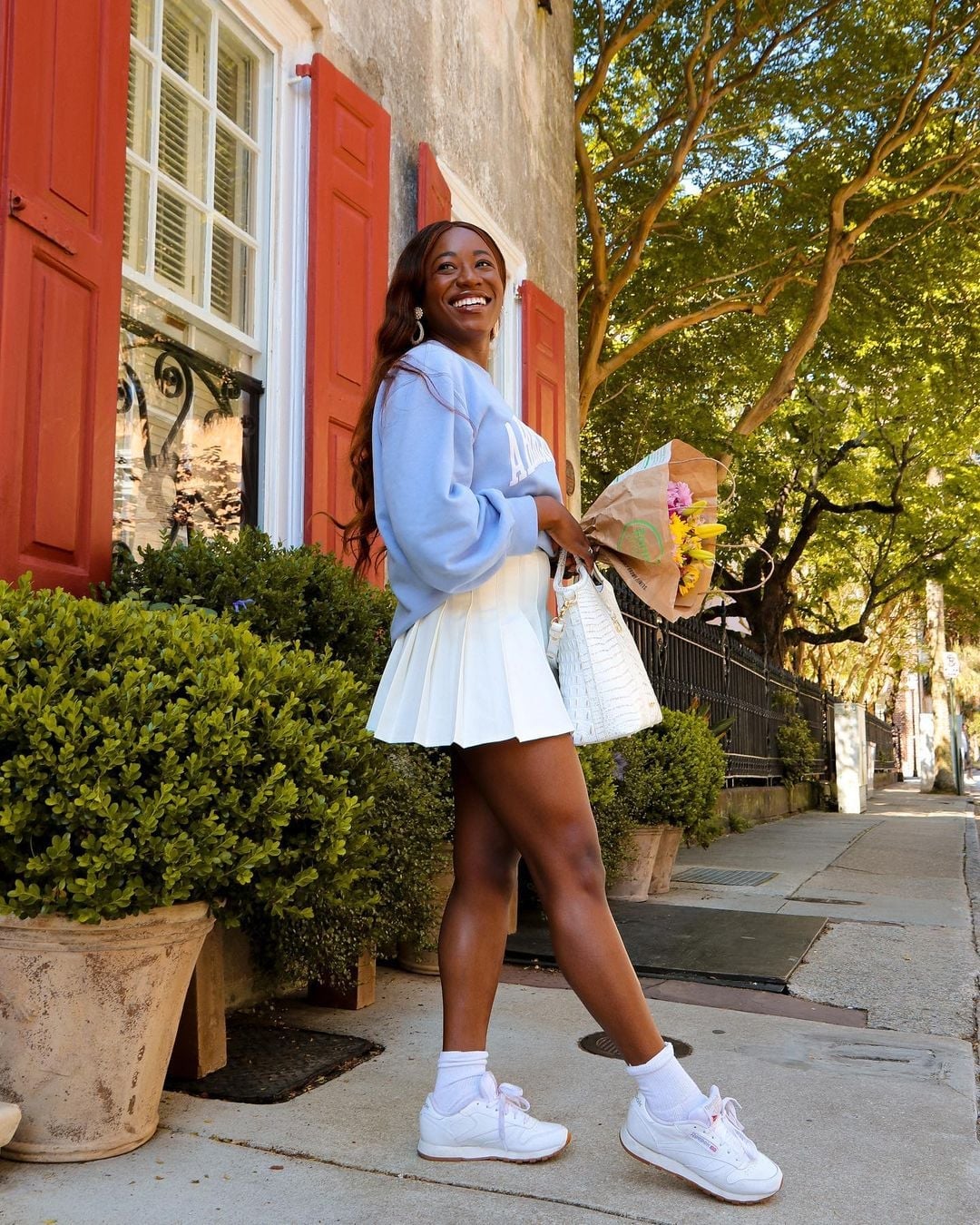 White Tennis Skirt with Light Blue Cable Knit Sweater, Close-Up Take White Tennis Skirt with Light Blue Cable Knit Sweater, Close-Up Take — Tennis Skirt Outfits