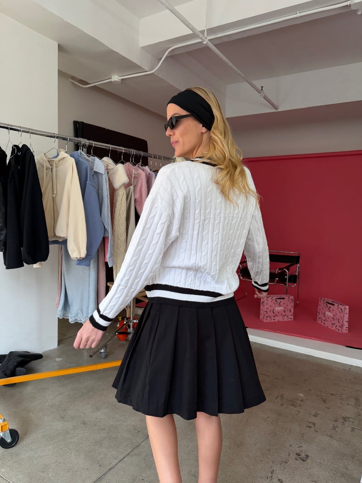 Black Tennis Skirt with White Cable Knit Sweater and Black Accessories Black Tennis Skirt with White Cable Knit Sweater and Black Accessories — Tennis Skirt Outfits