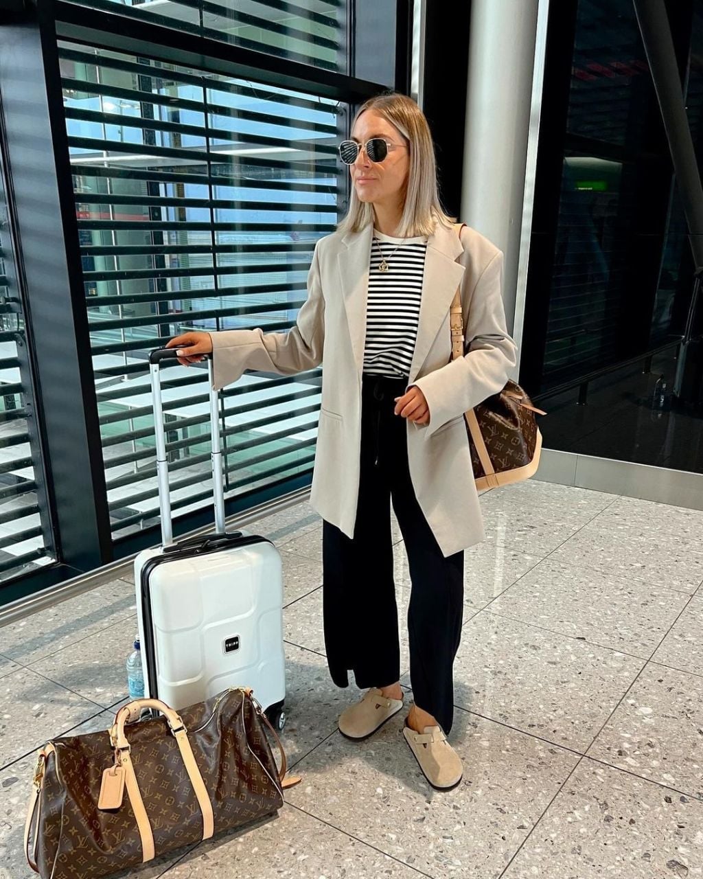 Beige Blazer and Striped Tee for Chic Travel Beige Blazer and Striped Tee for Chic Travel — Travel Outfits