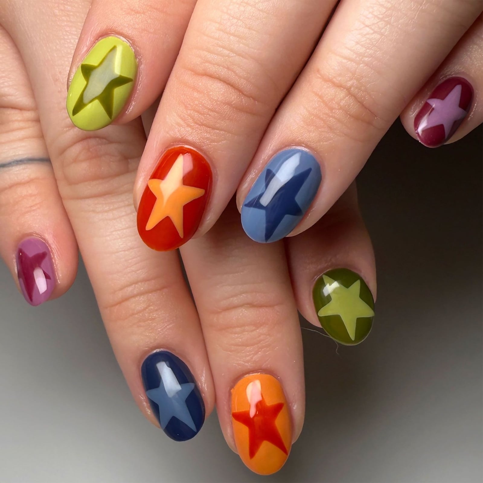 Short Oval Colorful Star Shape Nails — Trending Nails