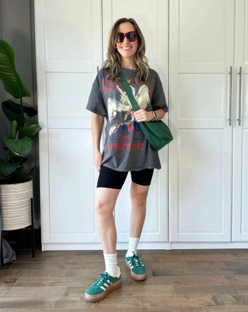 Oversized Graphic T-shirt With Black Bike Shorts And Green Sneakers Oversized Graphic T-shirt With Black Bike Shorts And Green Sneakers — Tshirt Outfit