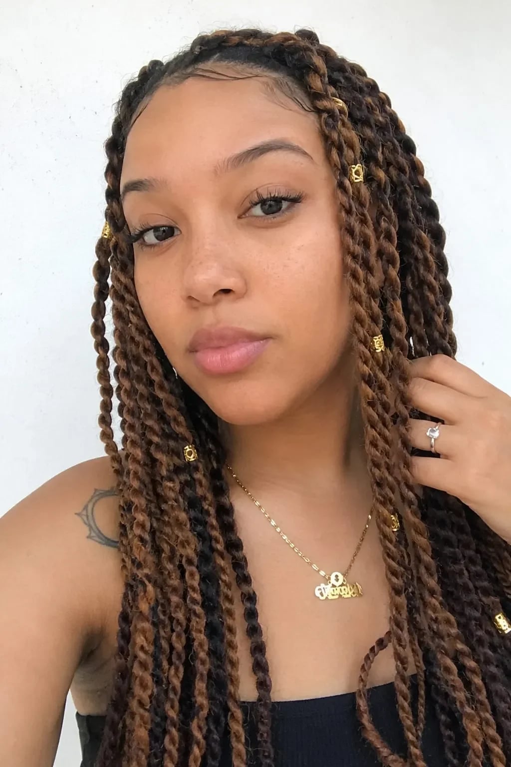 Shoulder Length Two Strand Twists With Gold Beads Shoulder Length Two Strand Twists With Gold Beads