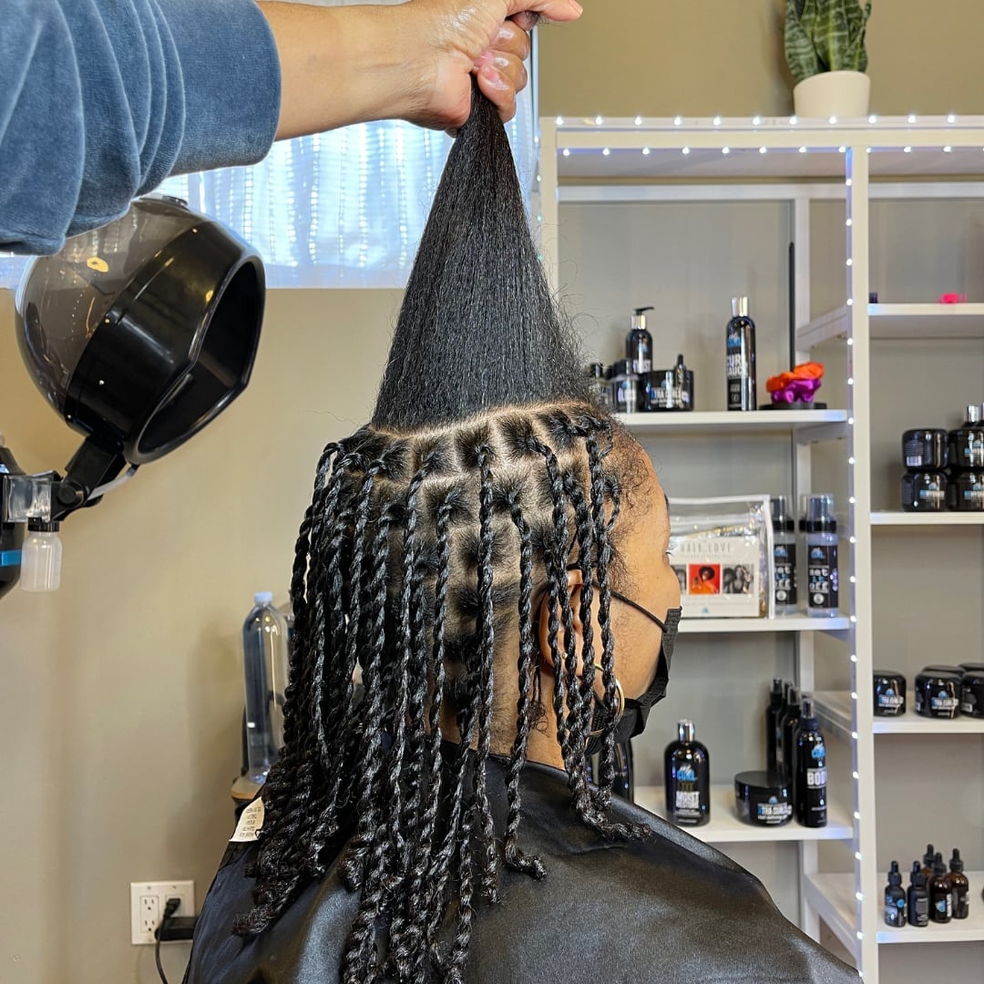 Mid-Back Neatly Sectioned Twists Mid-Back Neatly Sectioned Twists — Two Strand Twists