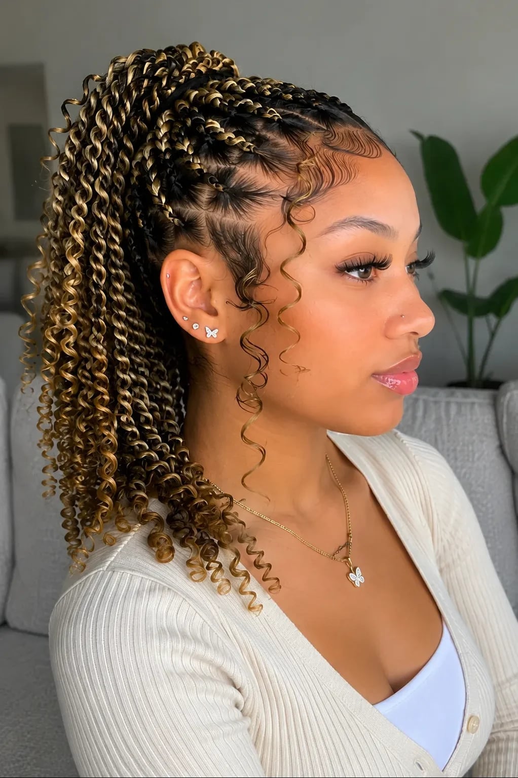 Mid-Back Twists Styled Into A High Bun Mid-Back Twists Styled Into A High Bun — Two Strand Twists