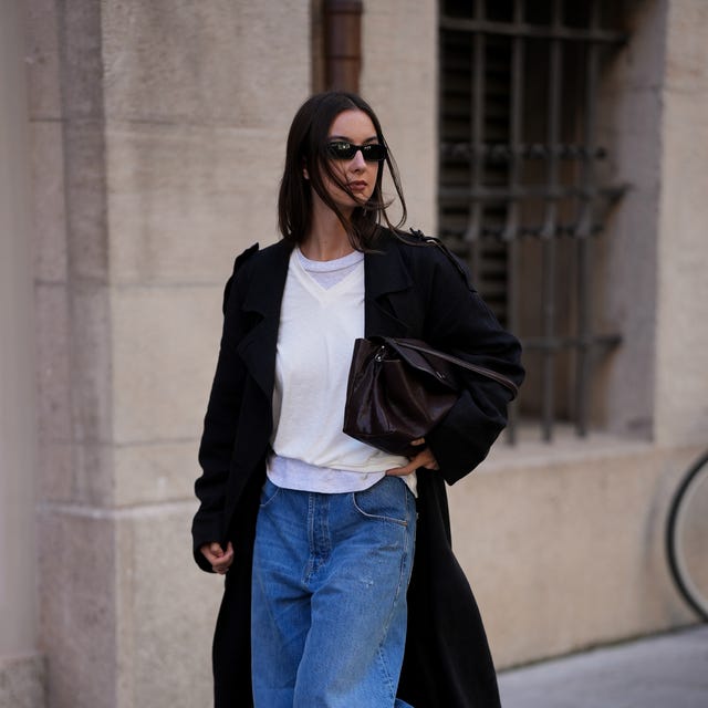 Black Trench Coat Over T-Shirt and Wide-Leg Jeans — Vintage Style