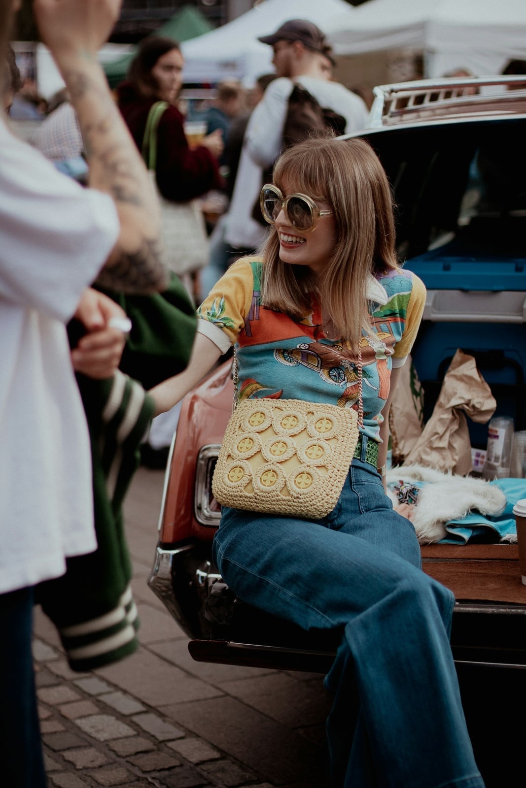 Retro Printed Top with Wide-Leg Jeans and Round Sunglasses — Vintage Style