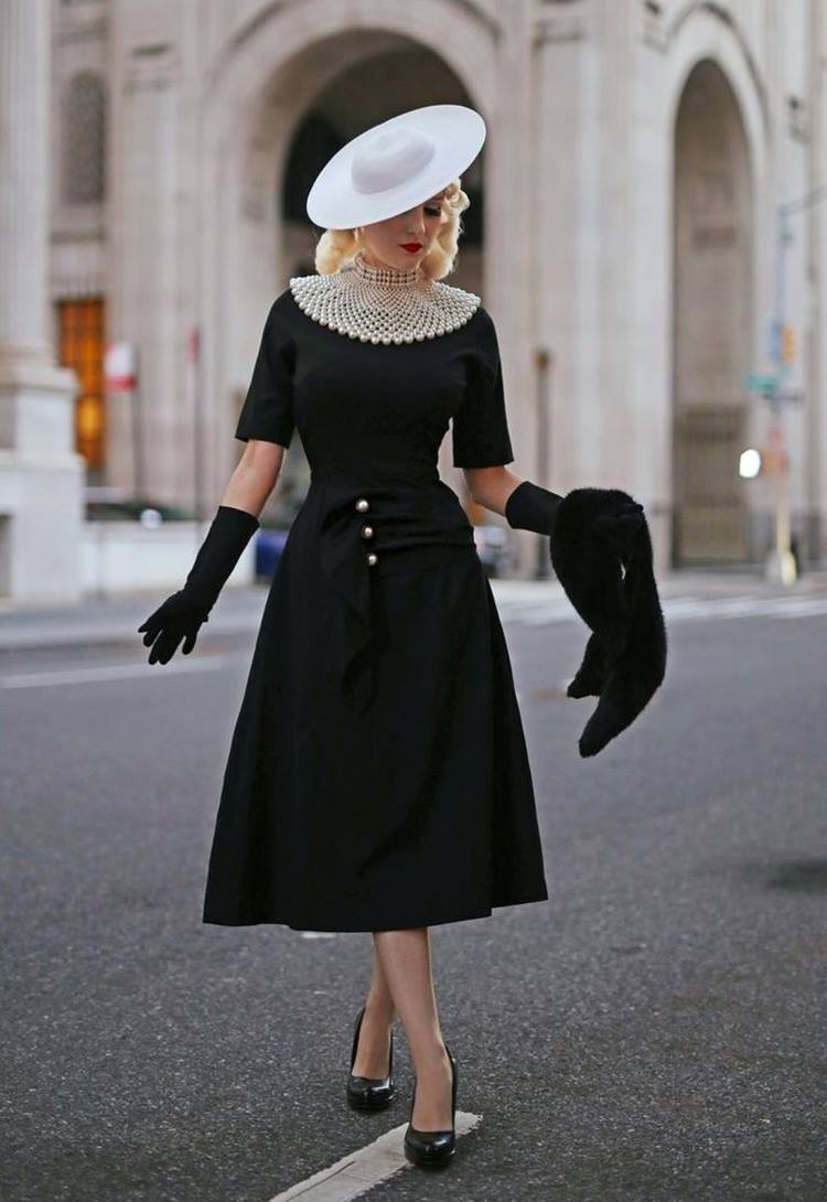Black Fit-And-Flare Dress with Oversized Pearl Collar and White Hat — Vintage Style