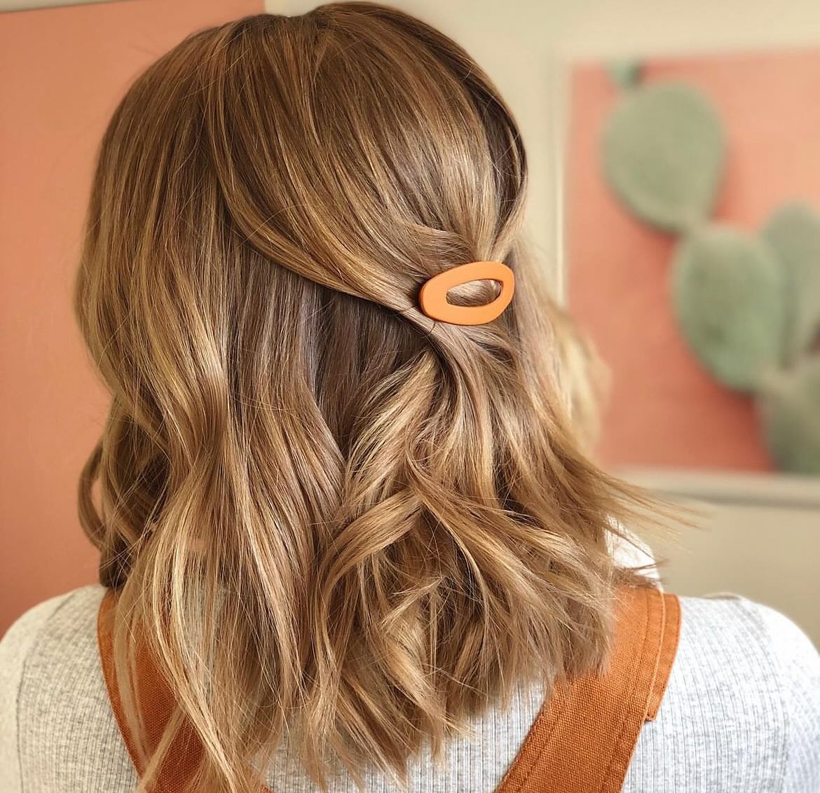 Warm Honey Blonde Waves With Half-Up Clip
