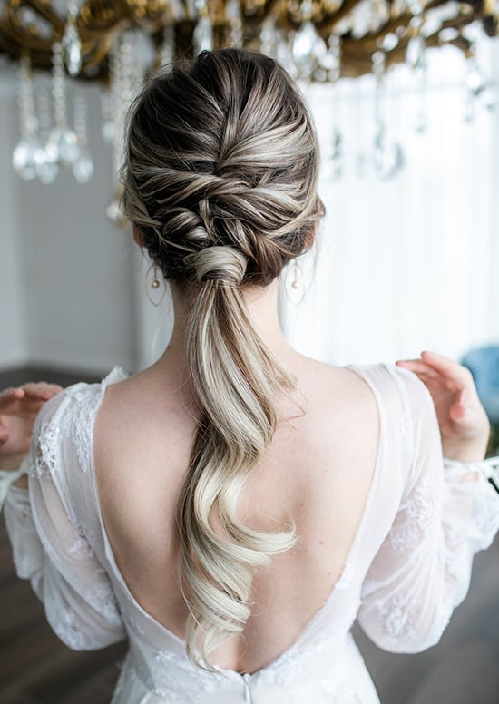 Braided Low Ponytail With Textured Finish Braided Low Ponytail With Textured Finish — Wedding Hairstyles for Long Hair