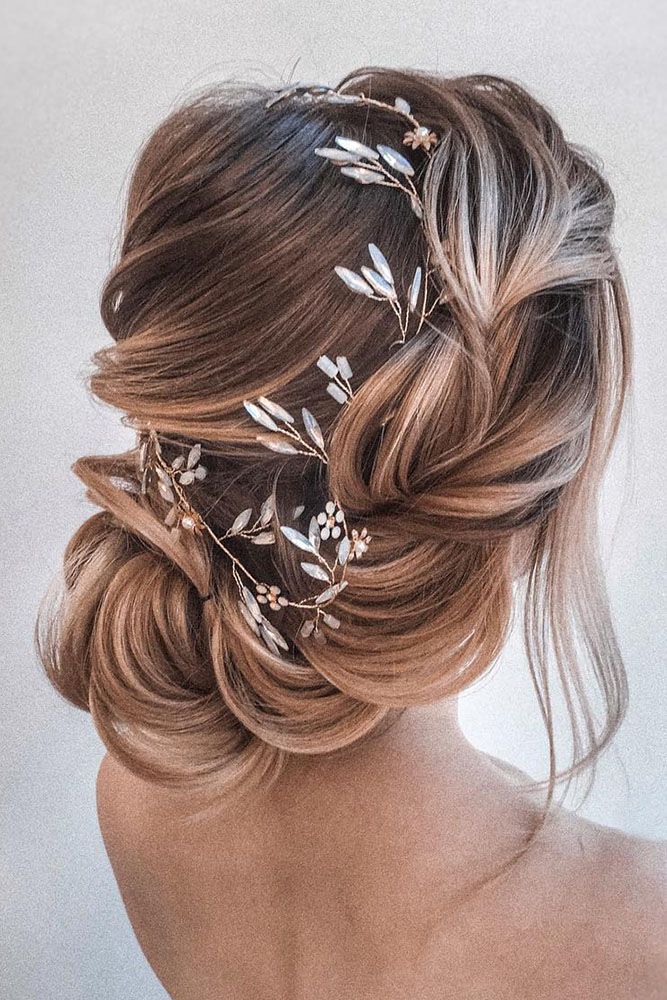 Low Twisted Updo With Ornate Accessory Low Twisted Updo With Ornate Accessory — Wedding Hairstyles for Long Hair