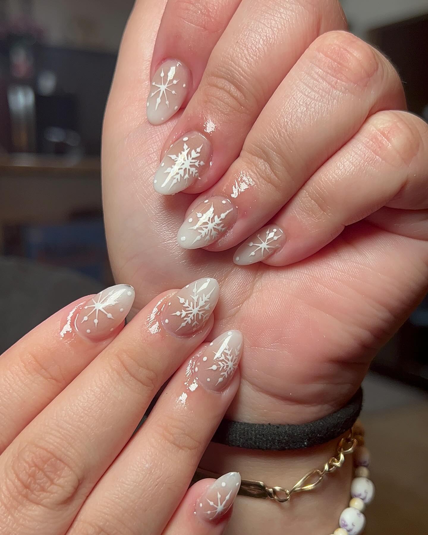 Whimsical Snowflake Almond Winter Nails
